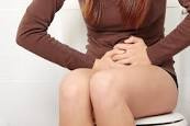 stomach ache woman on toilet